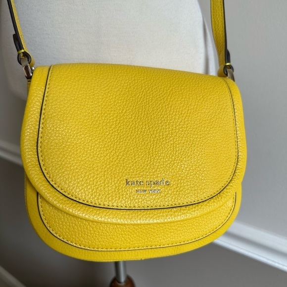 kate spade Handbags - NWOT Kate Spade Roulette Small Saddle Bag. Sold Out !!